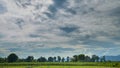 Time-lapse cloud before storm above summer landscape Royalty Free Stock Photo