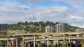 Time lapse of clouds over freeway traffic on Marquam bridge with homes on hillside in Portland OR 4k
