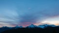 Time lapse of clouds over Tantalus Range in BC Canada at colorful sunset UHD