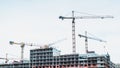Time lapse cranes and builders are working on the construction site Royalty Free Stock Photo