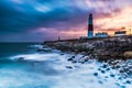 Time lapse of dramatic sunset and Portland Bill lighthouse Royalty Free Stock Photo