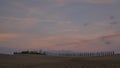 Time lapse of the estate Agriturismo Poggio Covili during sunset, with Tuscany trees and road, Italy