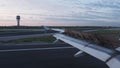 Time-lapse footage of aeroplane wing as plane lands moving forwards and backwards