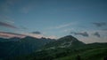 Back and forth timelapse video of clouds over mountains, Verbier, Switzerland
