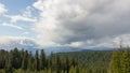 Time Lapse Movie of Moving White Clouds against Blue Sky Over Snow Cover Mount St. Helens from McClellan Viewpoint 1080p