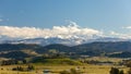 Time lapse of moving clouds and sky over Mt. Hood and rolling hills landscape pear orchards in Hood River OR 4k uhd