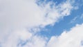 Time-lapse moving rolling white and gray clouds time lapse. Blue sky with light white and dark gray clouds cumulus rapidly rolling