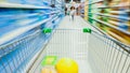 Time Lapse of the Shopping Cart Moving Between Various Aisles and Section in the Big Supermarket. Inside Trolley Various