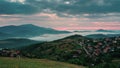 Time lapse with sunrise and fast-moving morning mists