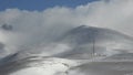 Time-lapse video of repeater tower under blizzard and strong snow windstorm in Altai Kuray mountain range in winter season