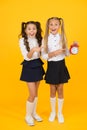 Time for lunch. School schedule. Schoolgirls and alarm clock. Children school pupils adorable formal uniform outfit