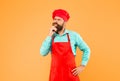 time for lunch. thinking bearded chef. male cook in hat and apron. professional man cooking. restaurant cuisine and Royalty Free Stock Photo