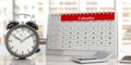 Time management concept. Calendar and an alarm clock, office background. 3d illustration Royalty Free Stock Photo