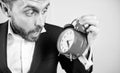 Time management skills. How much time left till deadline. Time to work. Man bearded surprised businessman hold clock Royalty Free Stock Photo