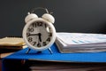 Time management. Watch and pile of documents and papers Royalty Free Stock Photo