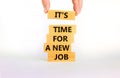 It is time for a new job symbol. Wooden blocks with words It is time for a new job. Beautiful white background, copy space. Royalty Free Stock Photo
