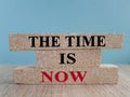 The time is now - words on brick blocks with red letters, the time is now concept, Royalty Free Stock Photo