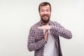 Time out! Portrait of tired worried bearded man gesturing i need more time, give pause. white background Royalty Free Stock Photo