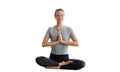 Time for practicing yoga. Young attractive woman sitting in Ardha Padmasana exercise, Lotus pose on meditation, closed eyes, Royalty Free Stock Photo