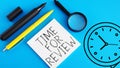 Time for review is shown using the text and picture of clock Royalty Free Stock Photo