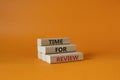 Time for Review symbol. Wooden blocks with words Time for Review. Beautiful orange background. Business and Time for Review Royalty Free Stock Photo