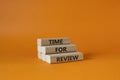 Time for Review symbol. Wooden blocks with words Time for Review. Beautiful orange background. Business and Time for Review Royalty Free Stock Photo
