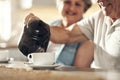 Time for some tea. a senior couple having breakfast together at home. Royalty Free Stock Photo