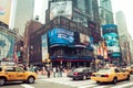 Time square with yellow taxi, New York