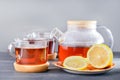 Time for tea, tea cups, teapot with hot tea and lemon Royalty Free Stock Photo