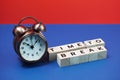 Time to Break alphabet letter with alarm clock on blue and red background Royalty Free Stock Photo