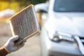 Time to change air filter. Man holding old and dirty car air conditioner filter Royalty Free Stock Photo