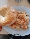 Time to eat bread with uzbek plov