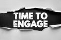 TIME TO ENGAGE text on torn paper. Marketing, communication, and interaction concept promoting customer connection, involvement, Royalty Free Stock Photo