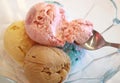 Time to enjoy strawberry ice cream, one of five scoops of ice cream in a glass bowl Royalty Free Stock Photo