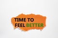 Time to feel better symbol. Torn orange paper with words Time to feel better. Beautiful white background. Medicine and Time to Royalty Free Stock Photo