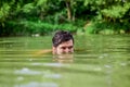 Time to get refreshed. pry and hunt. bearded man swimming in lake. summer vacation. mature swimmer. brutal hipster with Royalty Free Stock Photo