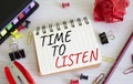 Time to listen symbol. Concept words Time to listen on white notebook. Beautiful wooden background. Business and Active listening Royalty Free Stock Photo