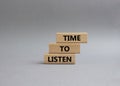 Time to listen symbol. Wooden blocks with words Time to listen. Beautiful grey background. Business and Active listening concept. Royalty Free Stock Photo