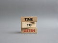 Time to listen symbol. Wooden blocks with words Time to listen. Beautiful grey background. Business and Active listening concept. Royalty Free Stock Photo