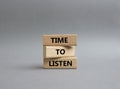 Time to listen symbol. Wooden blocks with words Time to listen. Beautiful grey background. Business and Active listening concept. Royalty Free Stock Photo
