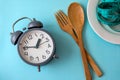 Time to lose weight , eating control or time to diet concept , a alarm clock with healthy tool concept decoration on blue Royalty Free Stock Photo