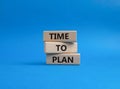 Time to plan symbol. Wooden blocks with words Time to plan. Beautiful blue background. Business and Time to plan concept. Copy Royalty Free Stock Photo