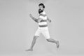 Time to relax. active runner in move. Hurry up. Summer vacation. Man bearded hipster run yellow wall. Guy beard striped