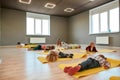 Time to relax. Group of children lying on yoga mats and relaxing. Dance school