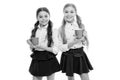 Time to relax. Schoolgirls with mugs having tea break. Relax and recharge. Water balance concept. Enjoying tea together Royalty Free Stock Photo