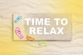 Time to relax: summer holidays on the beach with text for promot