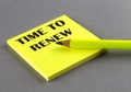 TIME TO RENEW text written on a sticky on grey background Royalty Free Stock Photo