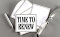 TIME TO RENEW text written on a sticky with pencil and glasses Royalty Free Stock Photo