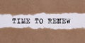 TIME TO RENEW written under torn paper on white background Royalty Free Stock Photo