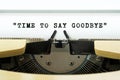 Time to say goodbye word typed on a yellow vintage typewritter. Business concept